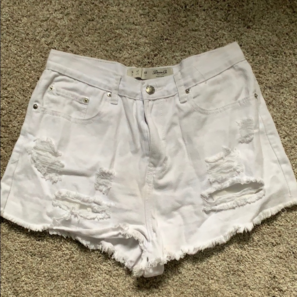 White distressed denim shorts